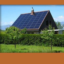 house, steep roof with photovoltaic panels